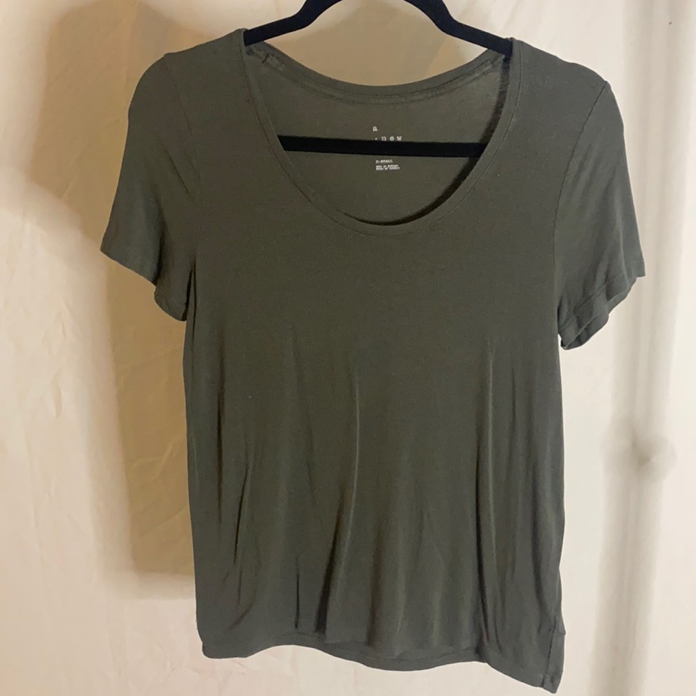 Olive green tee. Size XS.